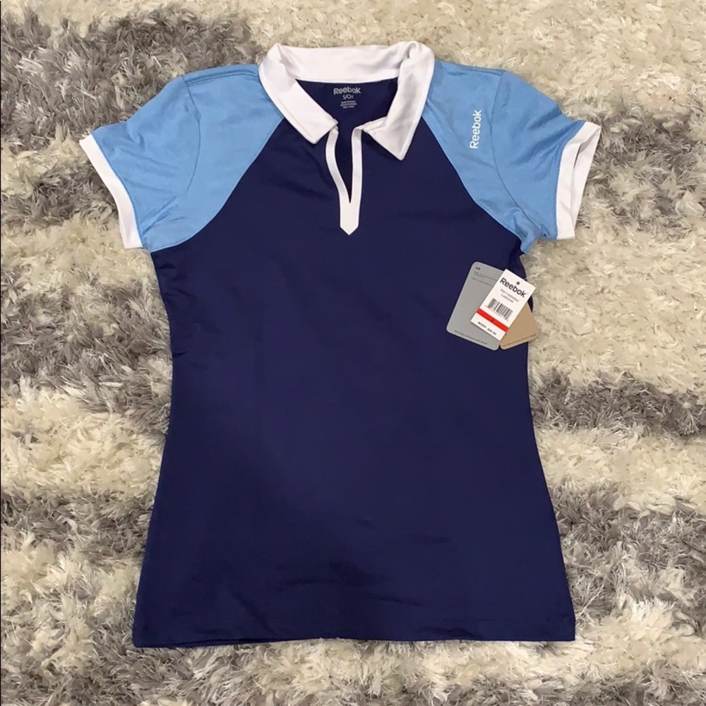 Reebok short sleeve dusty blue golf/tennis top